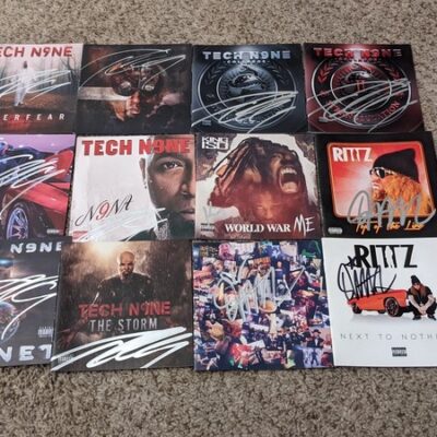 Strange music autograph cd covers