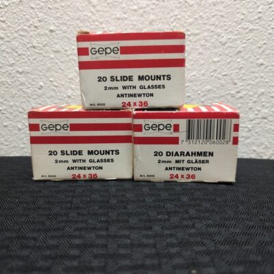 Three brand new vintage boxes of Gepe 2mm Slide Mounts with glasses Antinewton