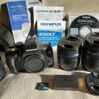 Olympus Evolt E-620 DSLR Camera, two lenses, carrying bag, lens hoods, strap