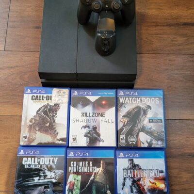 Sony Playstation 4 with Games and 2 Controllers