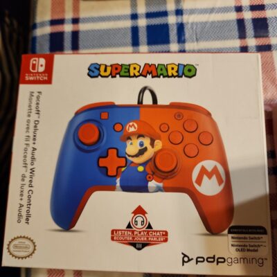 NINTENDO SWITCH controller SUPER MARIO  new in sealed box